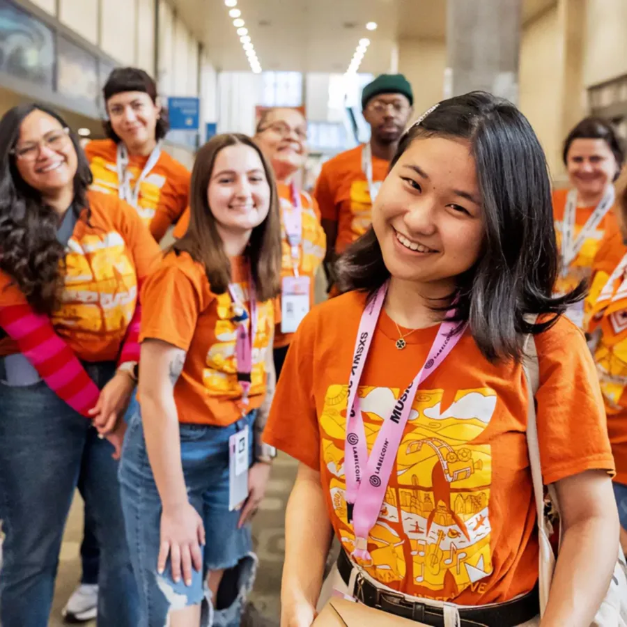 SXSW volunteers smiling at camera