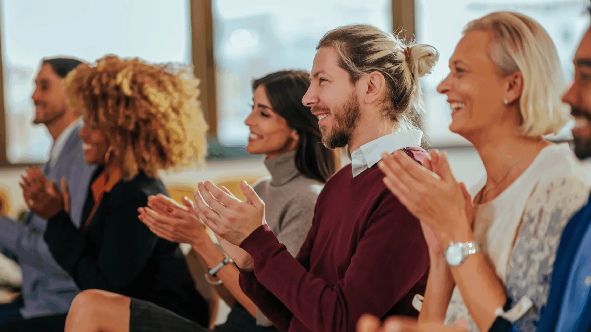 Group of people clapping