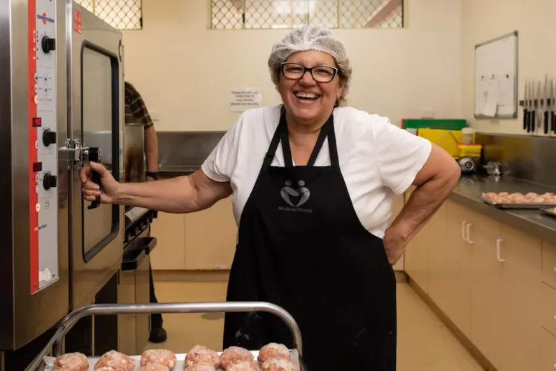 Meals on Wheels Queensland volunteer in kitchen