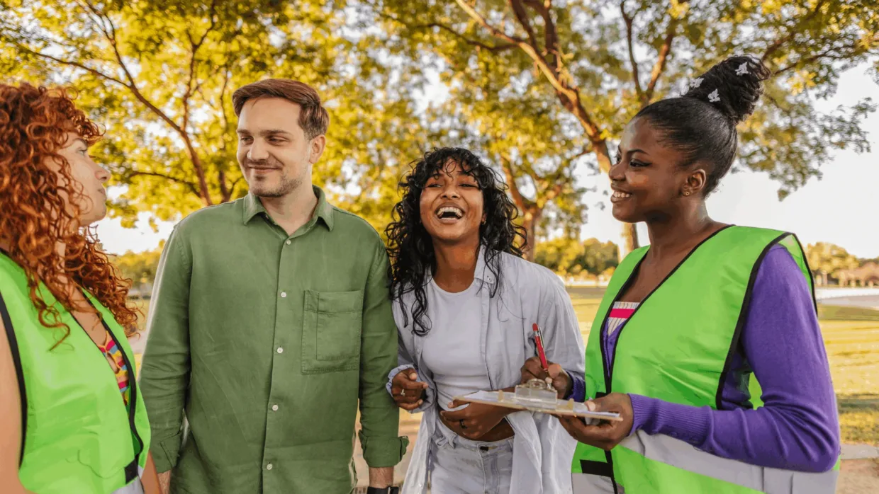 Group of volunteers outside smiling