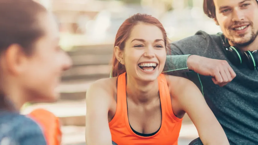 Happy woman after practicing sports