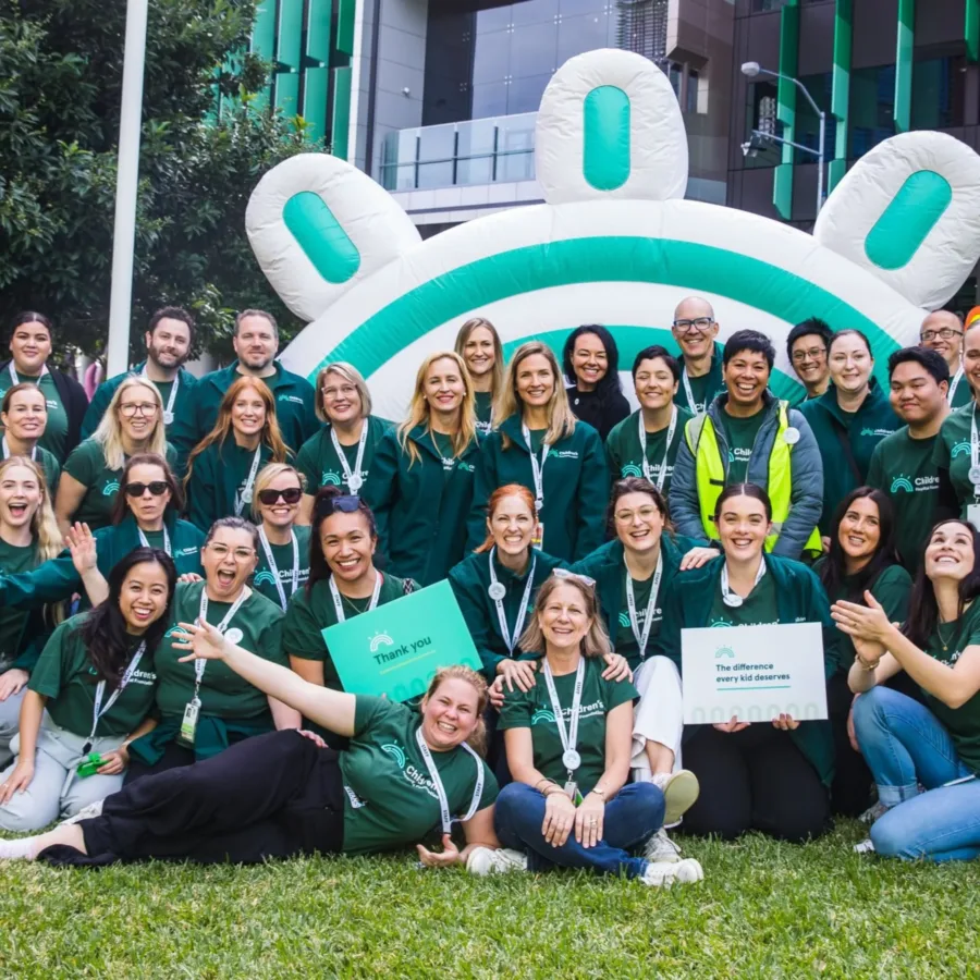 CHF volunteers smiling at the camera