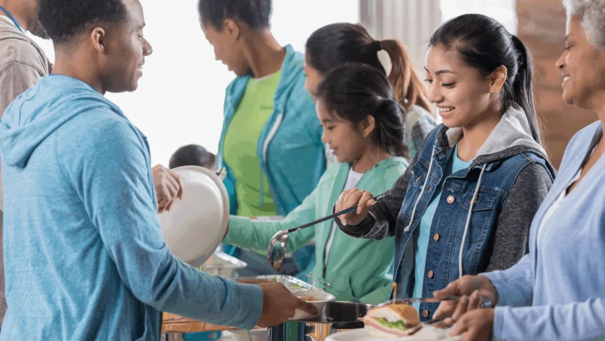Family volunteering at food bank