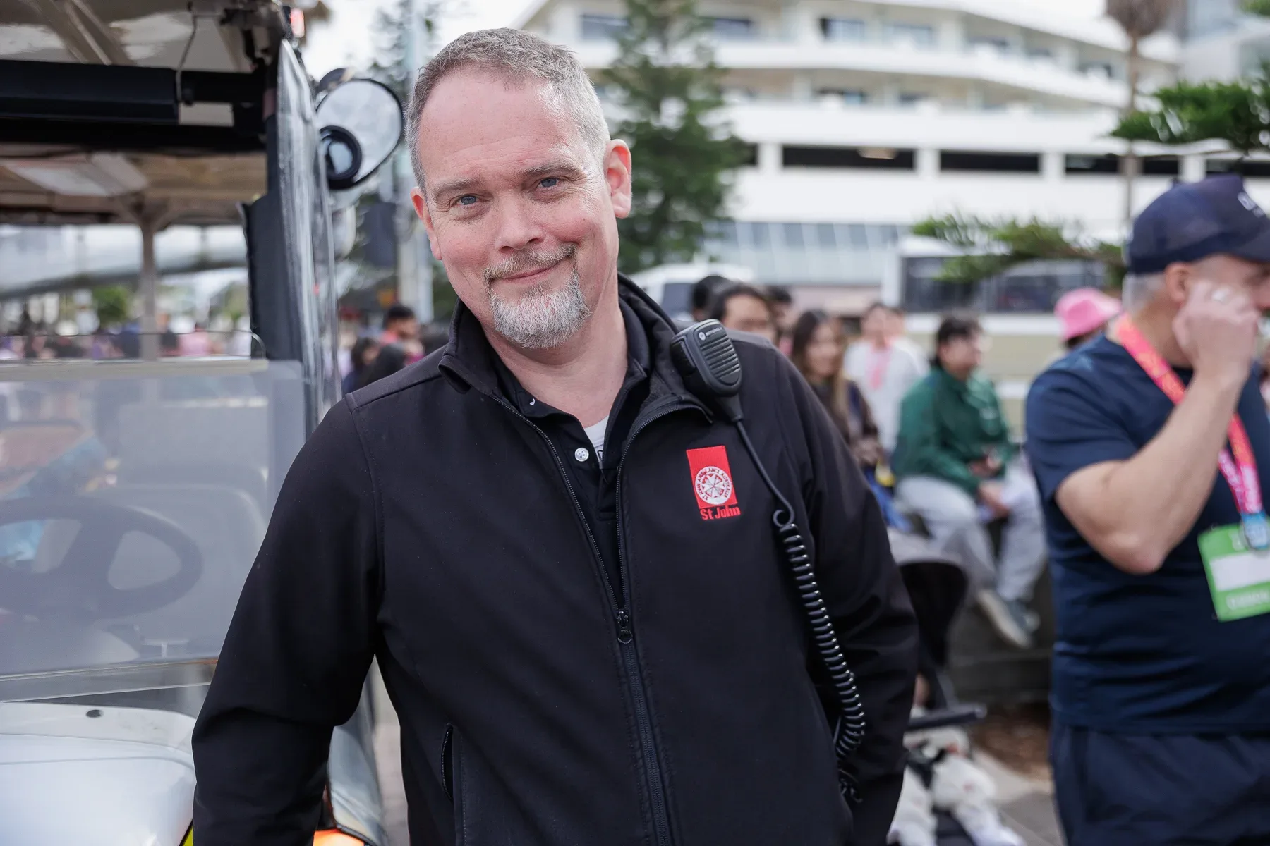 St John Ambulance volunteer smiling at camera