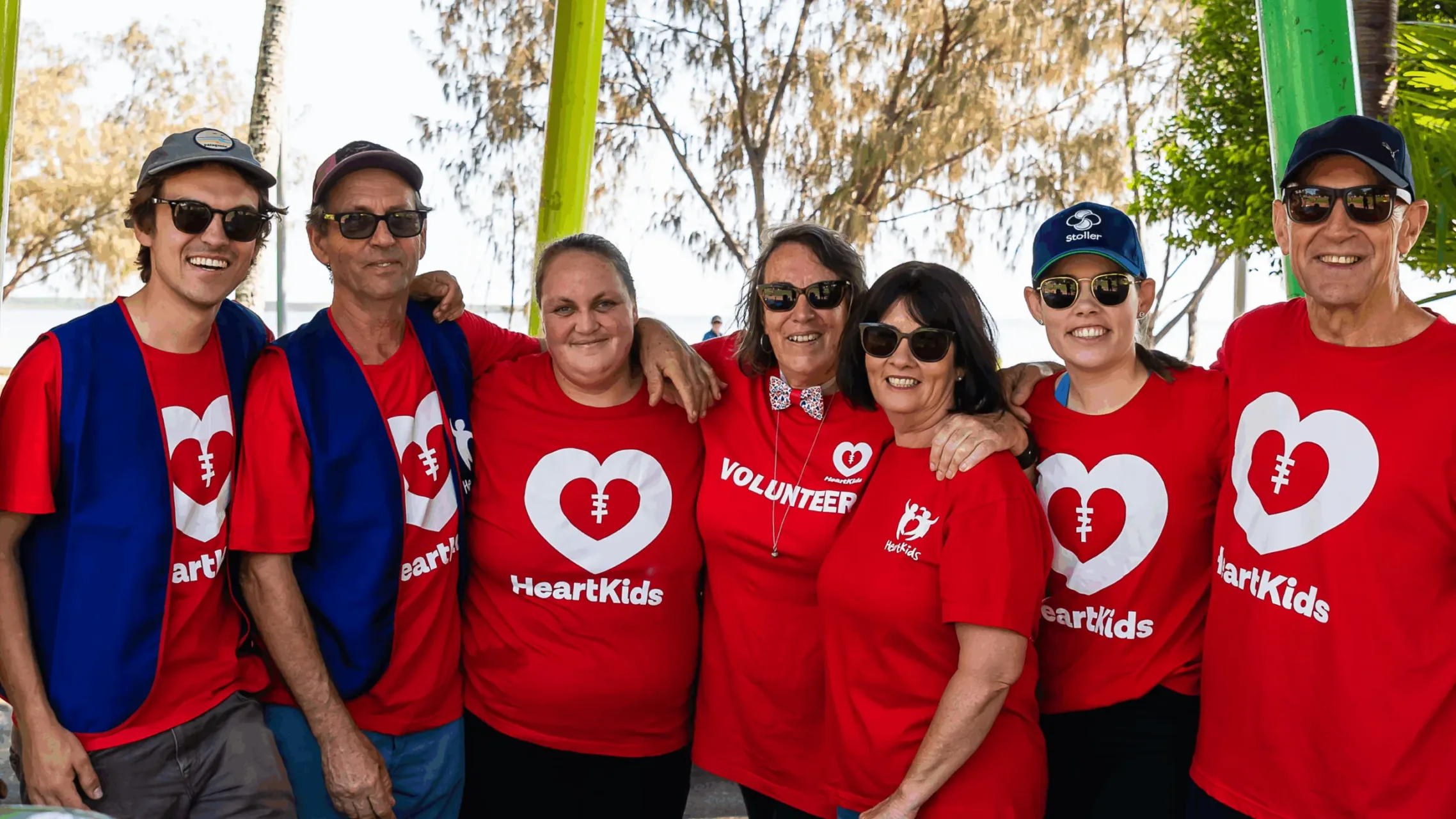 HeartKids volunteers smiling at camera for group photo