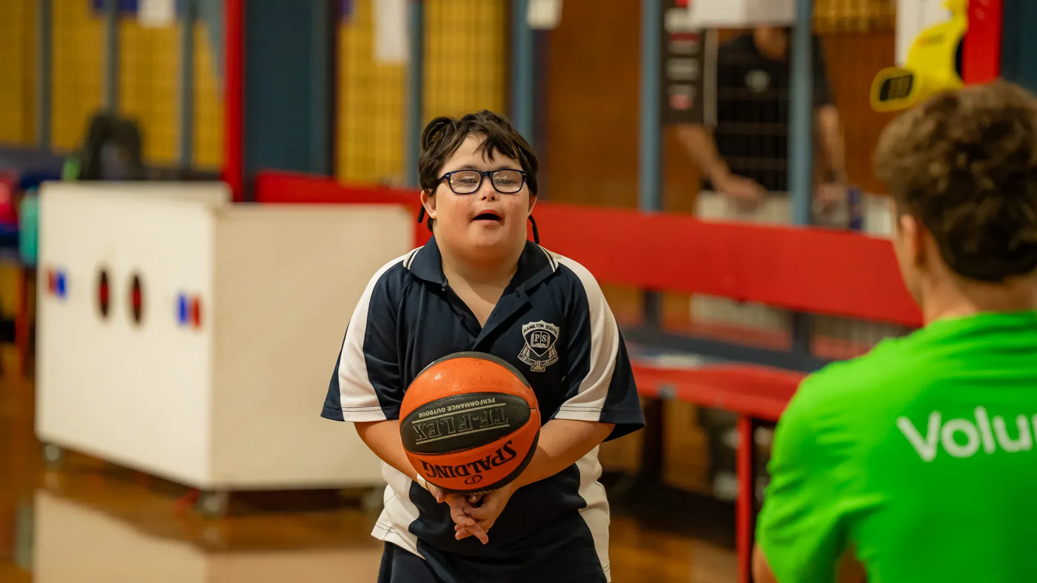 Disability Sports Australia - Little boy with a basketball